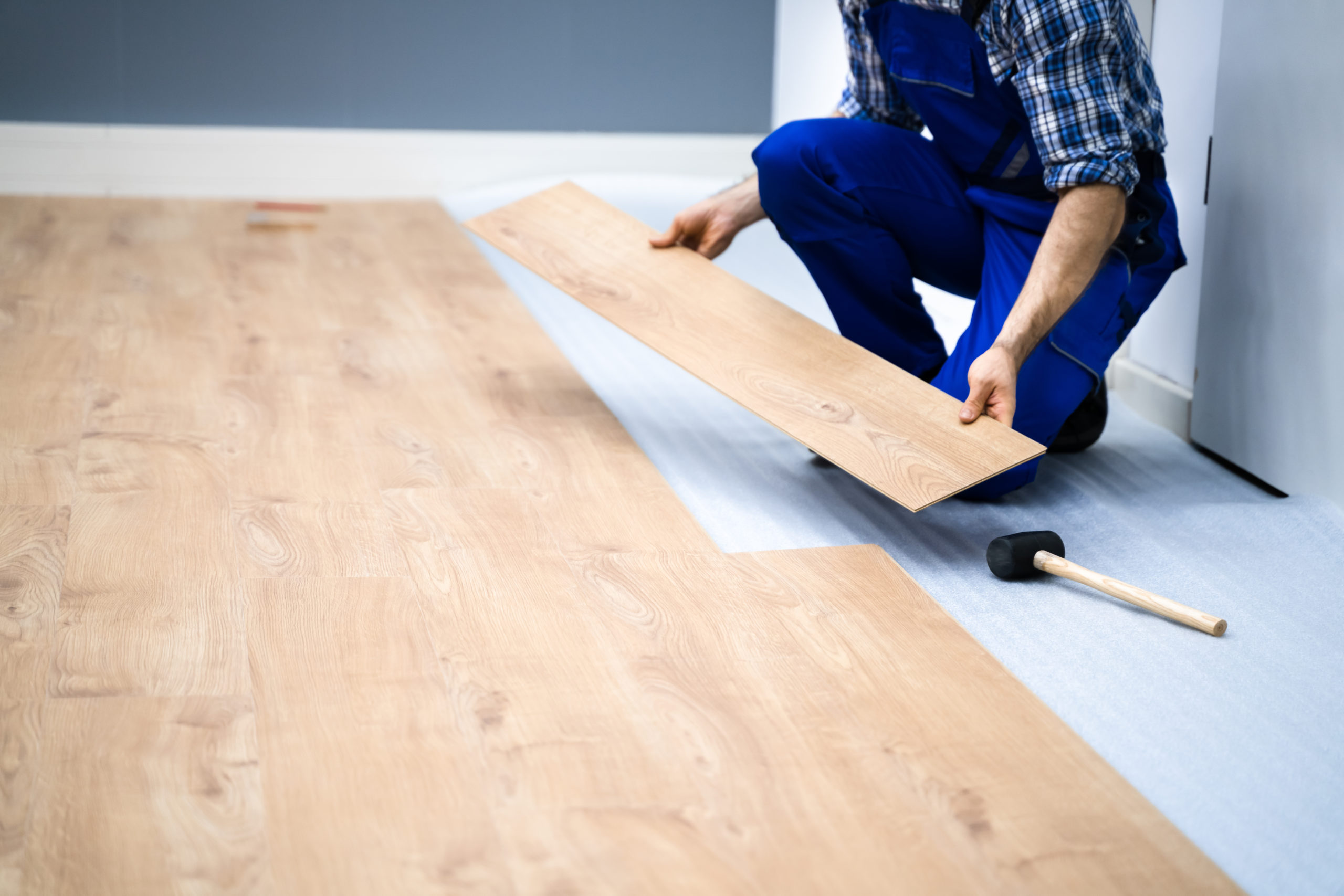 Worker,Installing,Home,Floor.,Carpenter,Laying,Laminate,Flooring